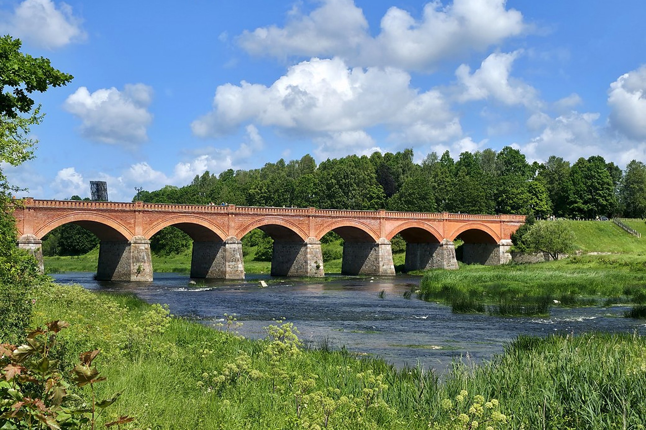 164 metres and seven arches. The span reads better from the bank than it ever does from the deck.