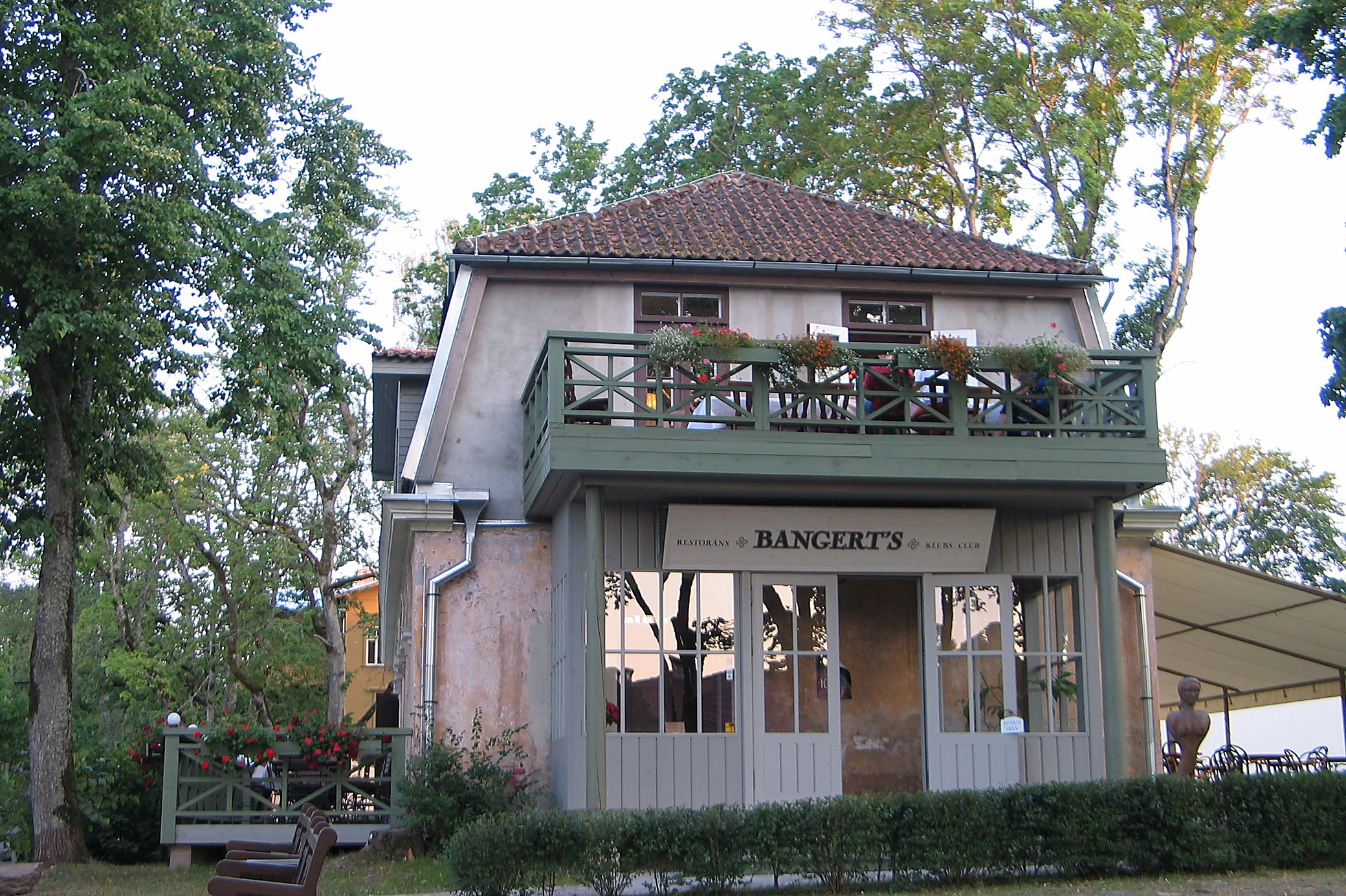Bangert’s, at Pils iela 1. The balcony and the terraces look straight out at the rapids.