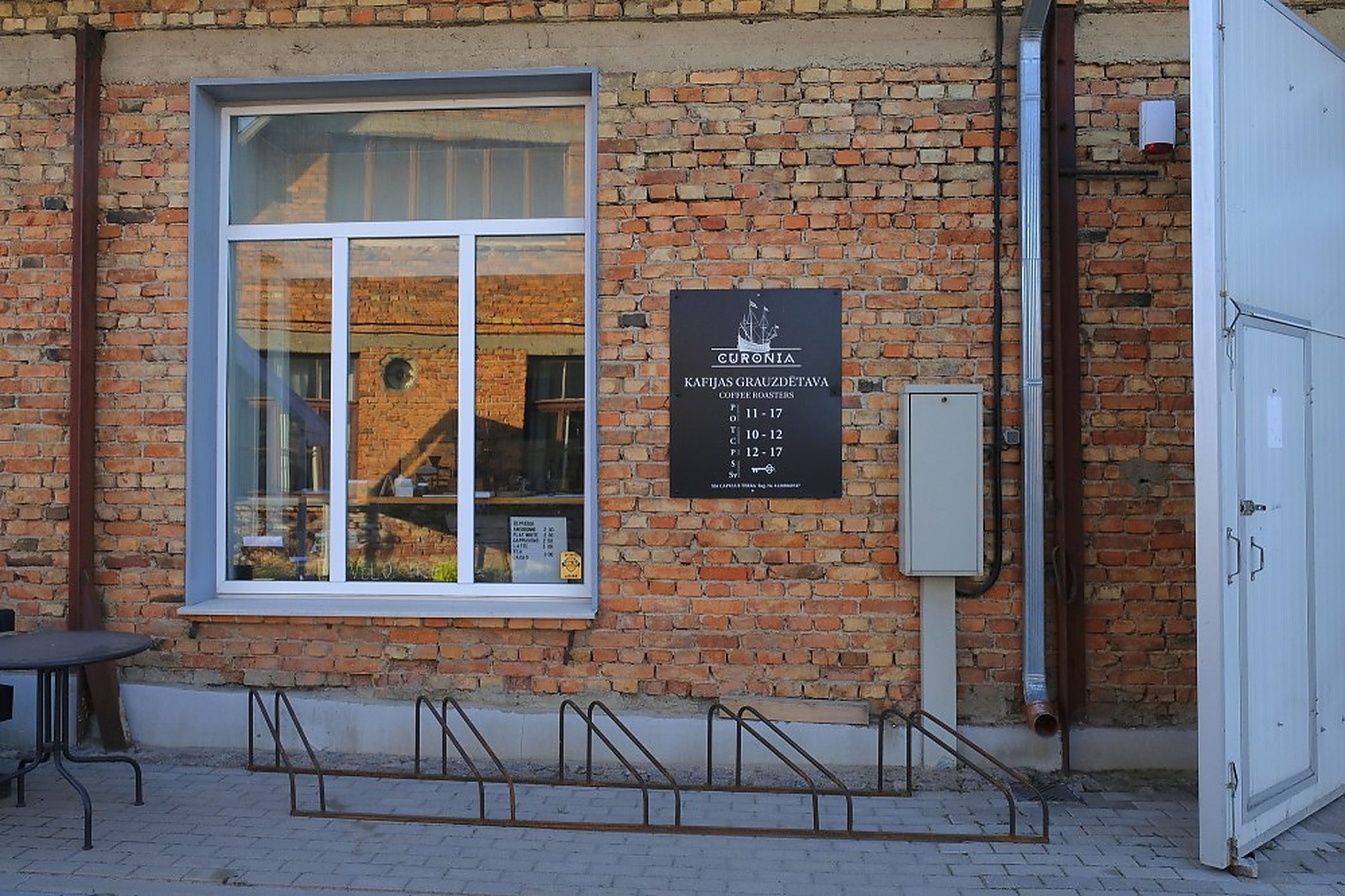 Curonia roasts on site in the same block. Opening hours are on the board by the door.