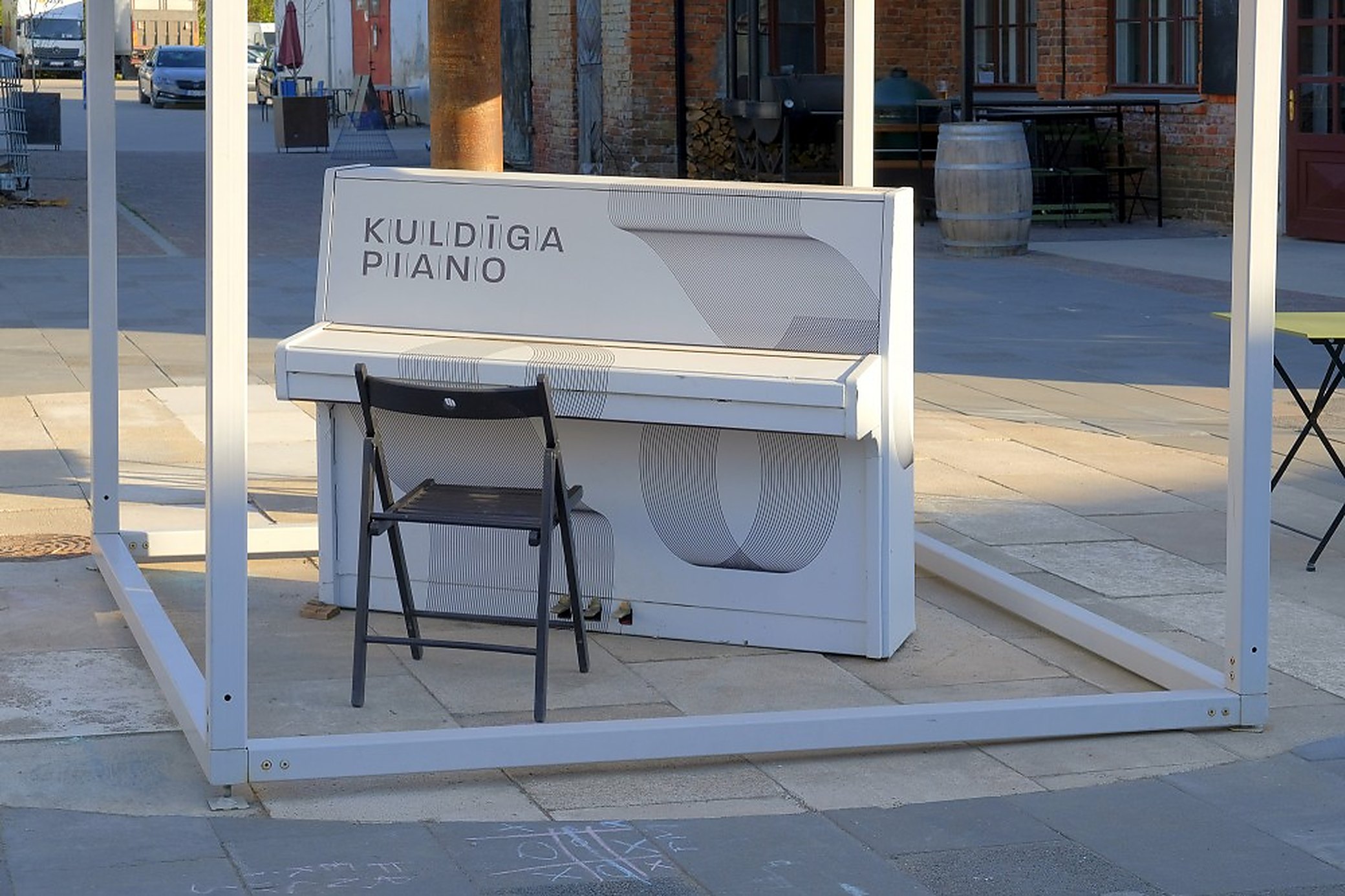 A finished Klavins upright out in the yard, badge and all.