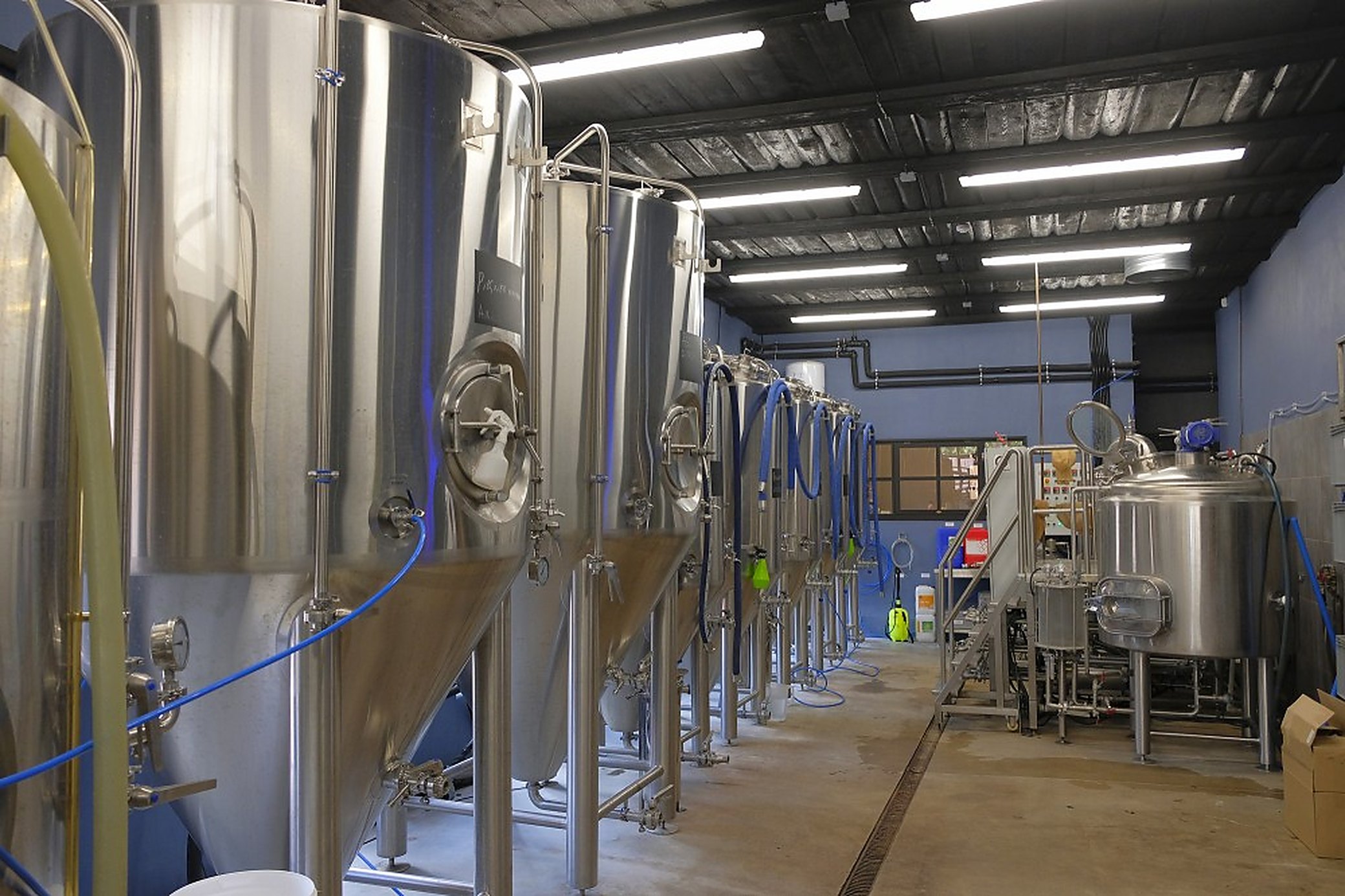The brewhouse. The taproom is directly opposite it, which is the whole idea.