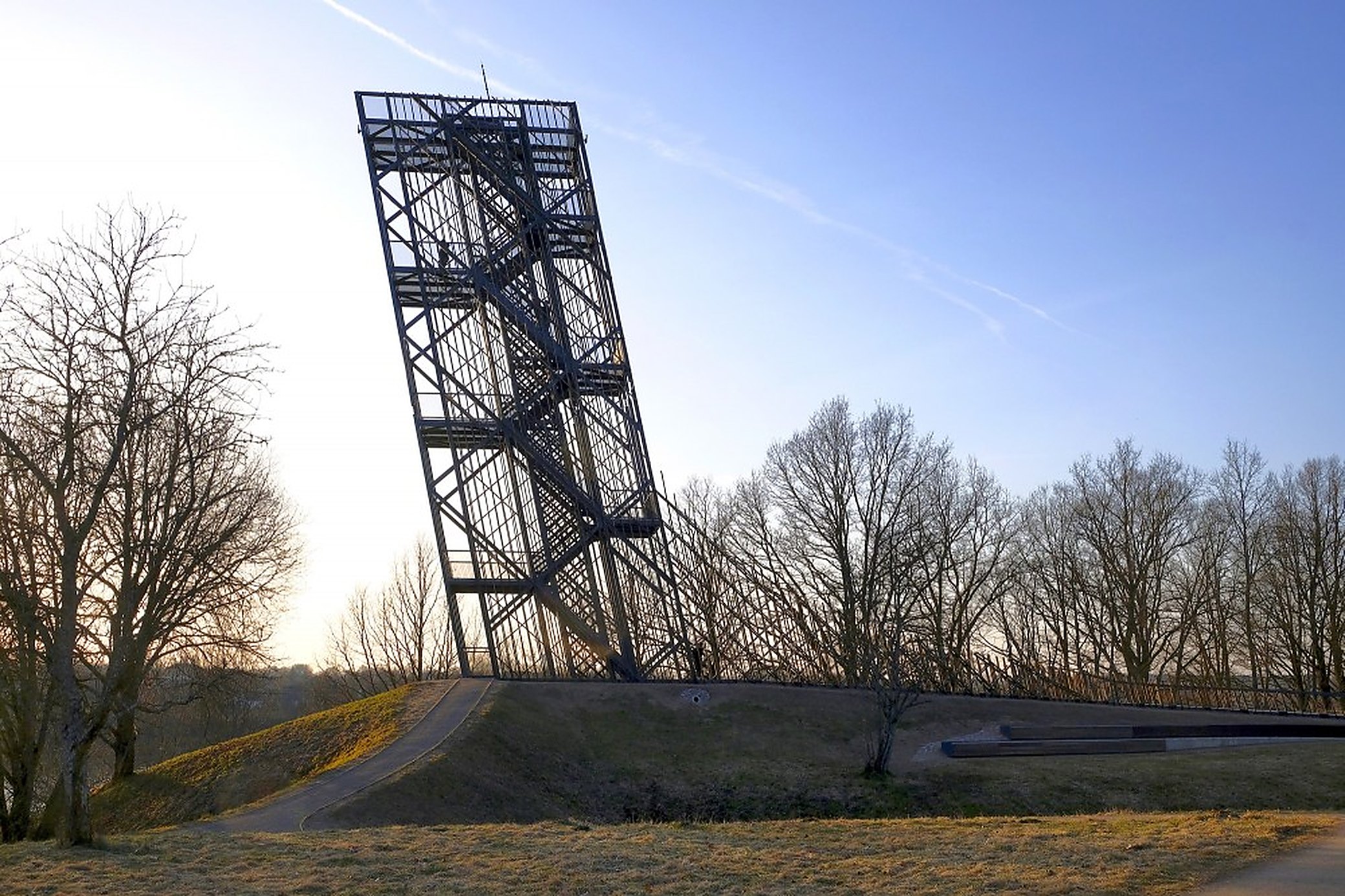 Twelve degrees off vertical, and built that way on purpose. A steeper lean than Pisa.